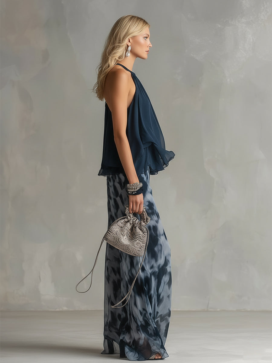 Luisa - elegante vestido de gasa con corpiño de cuello alto y pantalón ancho estampado.